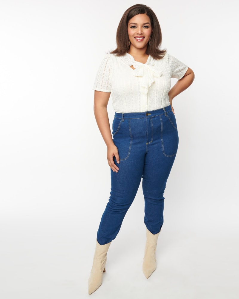 Front of a model wearing a size 2X/18 Unique Vintage Plus Size Blue Denim Cuffed Jeans in Blue Denim by Unique Vintage. | dia_product_style_image_id:269720